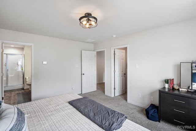 11348 Benton Pointe Way, Chester, VA 23831 - carpeted bedroom featuring baseboards and ensuite bath