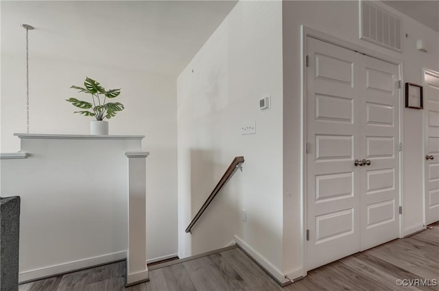12106 Oxford Landing Dr Unit 202, Glen Allen, VA 23059 - staircase with wood finished floors and baseboards