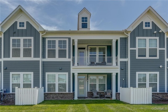 12106 Oxford Landing Dr Unit 202, Glen Allen, VA 23059 - back of house with board and batten siding, a balcony, and brick siding