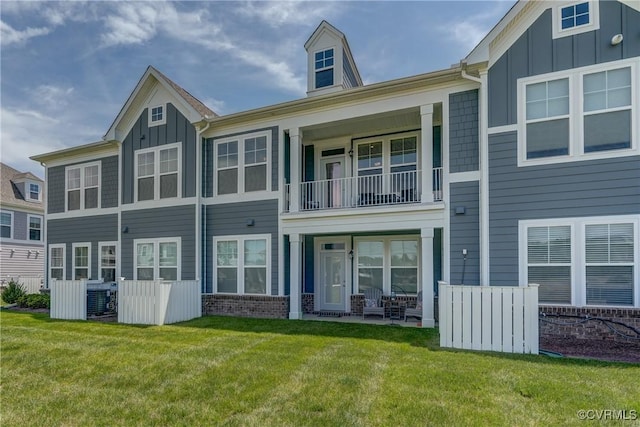 12106 Oxford Landing Dr Unit 202, Glen Allen, VA 23059 - rear view of property featuring board and batten siding, a balcony, and brick siding
