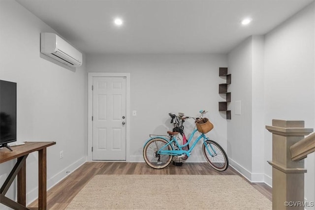5234 Old Main St Unit C, Henrico, VA 23231 - recreation room featuring a wall mounted air conditioner, wood finished floors, recessed lighting, and baseboards
