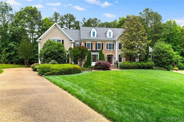 6306 Thistledew Mews, Moseley, VA 23120 - view of front of home featuring a front lawn and brick siding