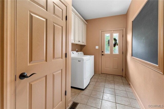 6306 Thistledew Mews, Moseley, VA 23120 - laundry room with separate washer and dryer, cabinet space, light tile patterned floors, and baseboards