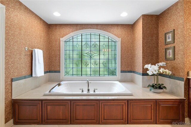 6306 Thistledew Mews, Moseley, VA 23120 - bathroom featuring wallpapered walls and a bath