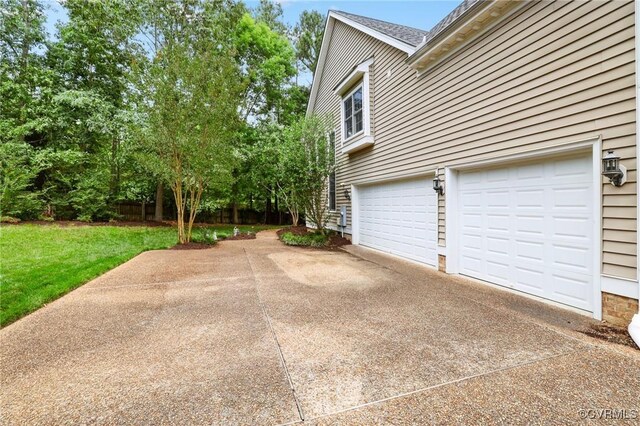6306 Thistledew Mews, Moseley, VA 23120 - garage with concrete driveway