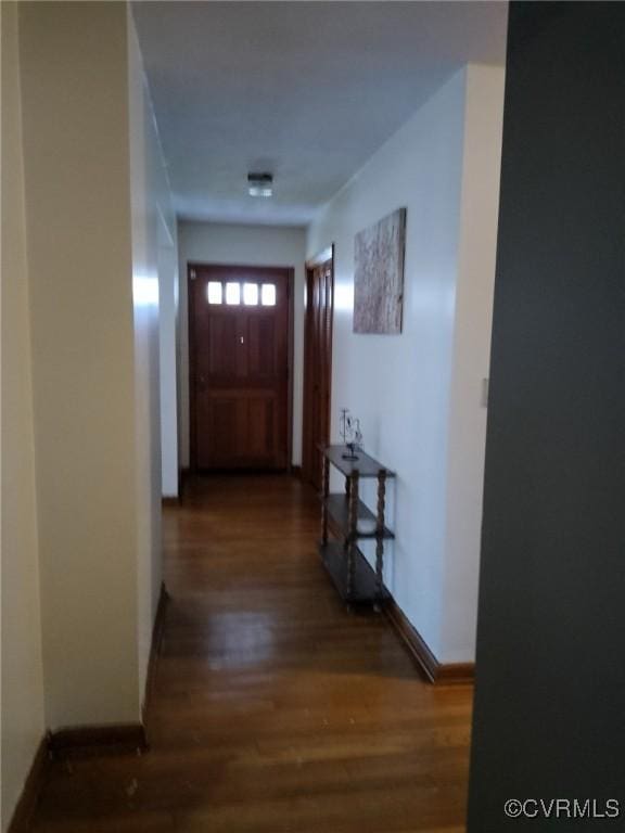 724 Milton Dr, Hampton, VA 23666 - hallway with wood finished floors and baseboards