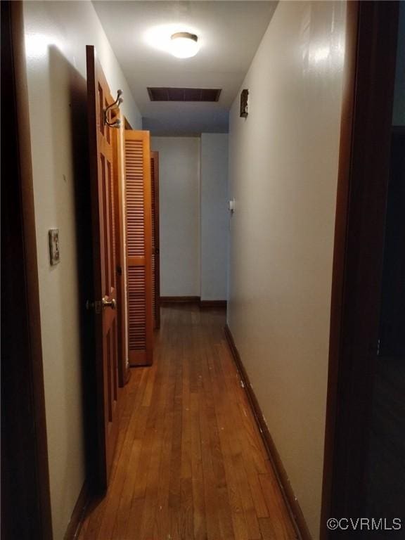 724 Milton Dr, Hampton, VA 23666 - corridor featuring wood-type flooring and baseboards