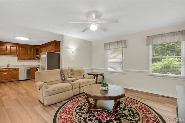 9865 Knobs Hill Ln, Amelia, VA 23002 - living area featuring a ceiling fan and light wood-type flooring