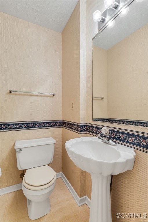 9865 Knobs Hill Ln, Amelia, VA 23002 - half bathroom featuring toilet and tile patterned flooring