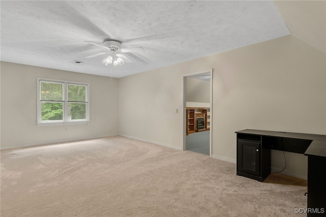 9865 Knobs Hill Ln, Amelia, VA 23002 - spare room with light colored carpet, ceiling fan, and a textured ceiling