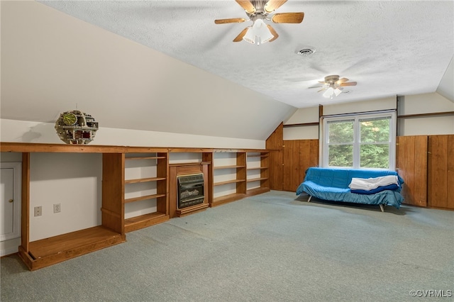 9865 Knobs Hill Ln, Amelia, VA 23002 - bonus room with light colored carpet, a textured ceiling, a ceiling fan, and vaulted ceiling