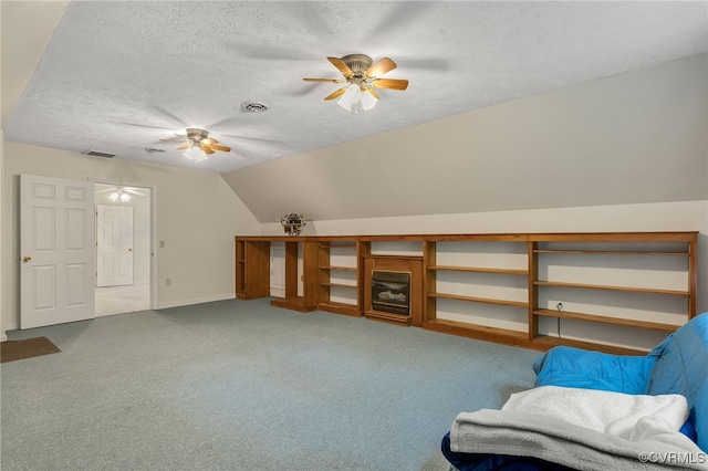9865 Knobs Hill Ln, Amelia, VA 23002 - living area with a ceiling fan, a textured ceiling, carpet flooring, and lofted ceiling