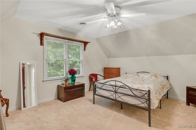 9865 Knobs Hill Ln, Amelia, VA 23002 - bedroom featuring light colored carpet, vaulted ceiling, and a ceiling fan