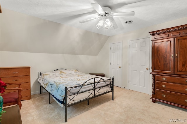 9865 Knobs Hill Ln, Amelia, VA 23002 - bedroom with light carpet, lofted ceiling, and a ceiling fan