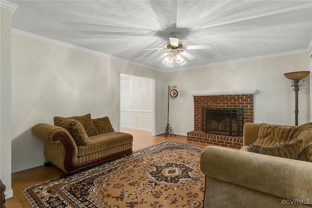 9865 Knobs Hill Ln, Amelia, VA 23002 - living room with ceiling fan, ornamental molding, a fireplace, and wood finished floors
