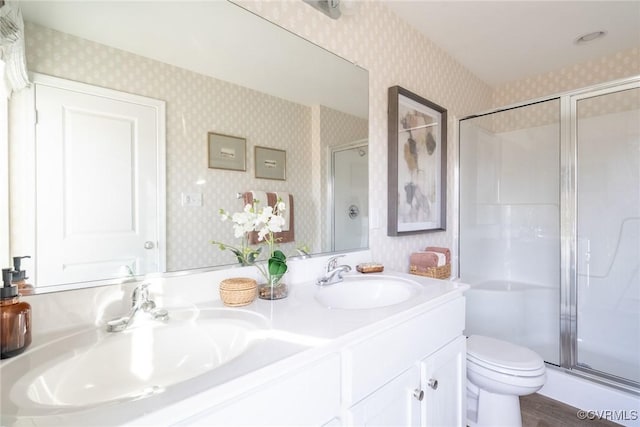 2124 Grand Reserve Way Unit N-1, Henrico, VA 23223 - full bathroom with wallpapered walls, a stall shower, toilet, double vanity, and wood finished floors