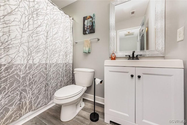 10913 Oak Arbor Ter, Chesterfield, VA 23831 - full bathroom with toilet, vanity, wood finished floors, and baseboards