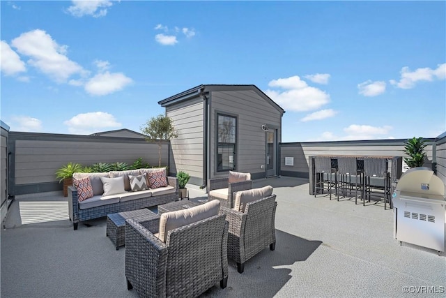 view of patio / terrace with an outdoor hangout area and a grill