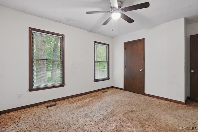 4501 Roxbury Rd, Charles City, VA 23030 - carpeted spare room with baseboards and ceiling fan