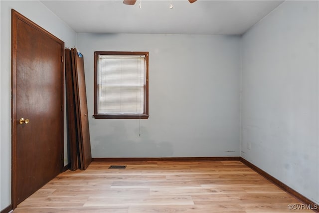 4501 Roxbury Rd, Charles City, VA 23030 - unfurnished bedroom with light wood finished floors, baseboards, a closet, and a ceiling fan