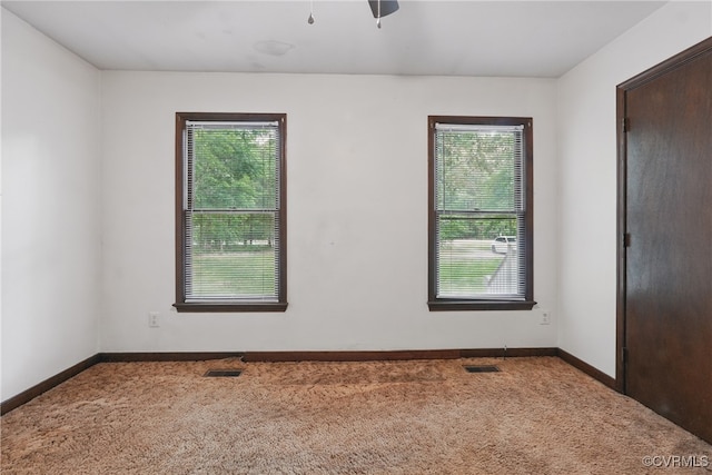 4501 Roxbury Rd, Charles City, VA 23030 - empty room featuring carpet floors, baseboards, and a ceiling fan
