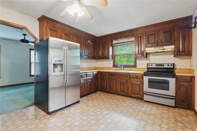 4501 Roxbury Rd, Charles City, VA 23030 - kitchen with appliances with stainless steel finishes, a ceiling fan, under cabinet range hood, and light countertops