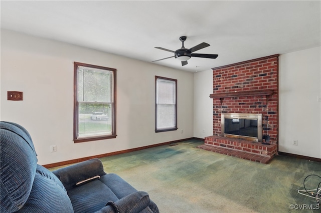 4501 Roxbury Rd, Charles City, VA 23030 - carpeted living area featuring baseboards, a ceiling fan, and a fireplace
