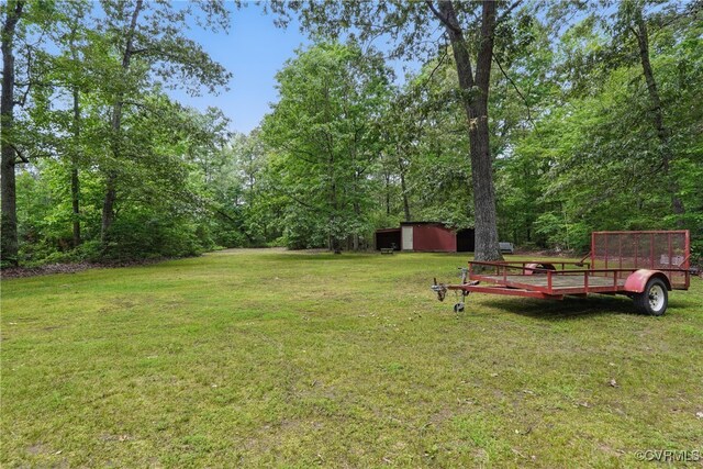 4501 Roxbury Rd, Charles City, VA 23030 - view of green lawn featuring an outdoor structure