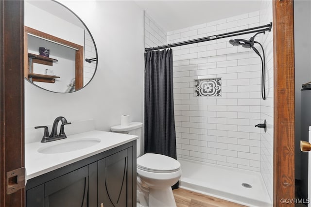 4501 Roxbury Rd, Charles City, VA 23030 - bathroom with vanity, a shower stall, toilet, and wood finished floors