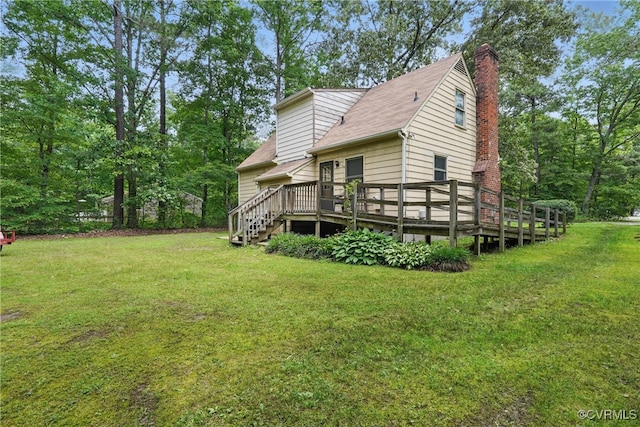 4501 Roxbury Rd, Charles City, VA 23030 - view of home's exterior with a lawn, a wooden deck, a chimney, and a shingled roof