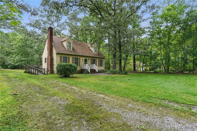 4501 Roxbury Rd, Charles City, VA 23030 - new england style home with a front lawn and a chimney