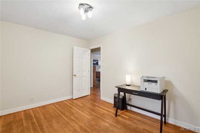 office featuring light wood-style floors and baseboards