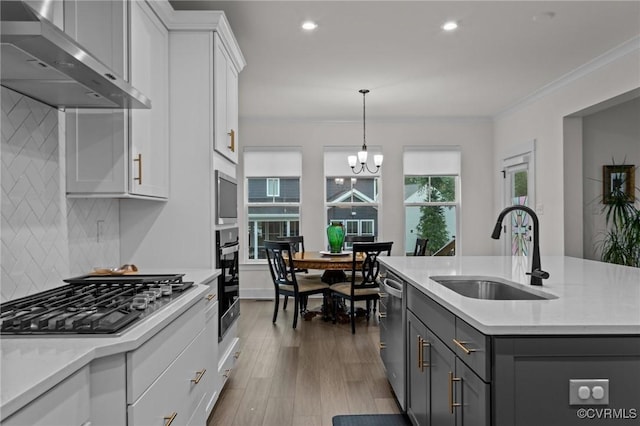9975 Honeybee Dr, Mechanicsville, VA 23116 - kitchen with a sink, wall chimney exhaust hood, stainless steel appliances, white cabinets, and gray cabinetry