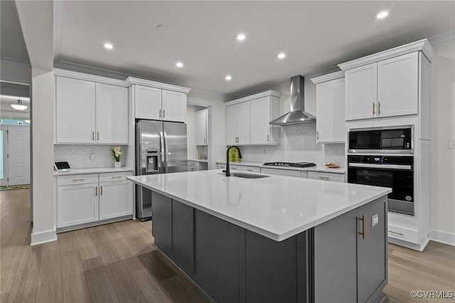 9975 Honeybee Dr, Mechanicsville, VA 23116 - kitchen with wall chimney range hood, stainless steel appliances, a sink, recessed lighting, and backsplash