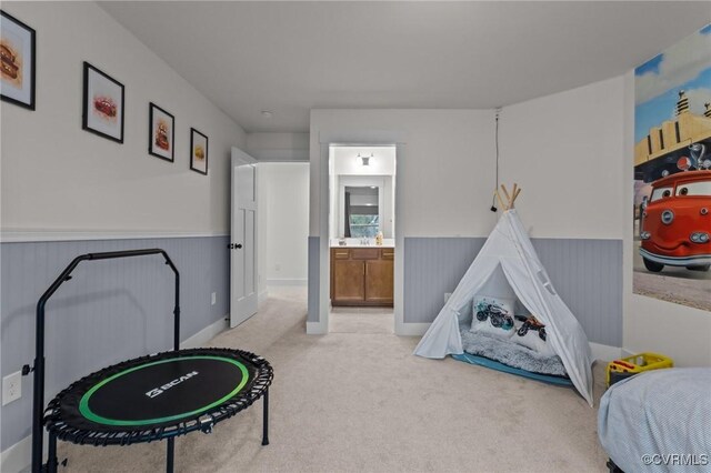9975 Honeybee Dr, Mechanicsville, VA 23116 - game room featuring light carpet and a wainscoted wall