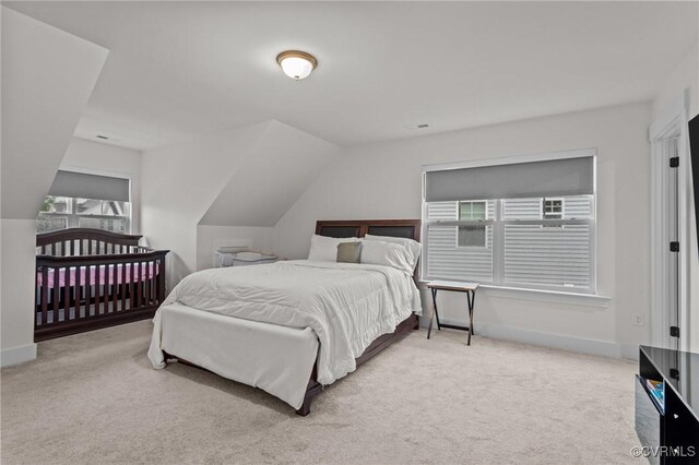 9975 Honeybee Dr, Mechanicsville, VA 23116 - carpeted bedroom with baseboards and vaulted ceiling