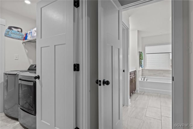 9975 Honeybee Dr, Mechanicsville, VA 23116 - clothes washing area featuring washing machine and dryer