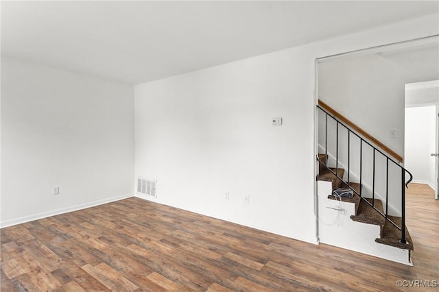 306 Cedarwood Rd, Henrico, VA 23075 - unfurnished room with wood finished floors, stairs, and baseboards
