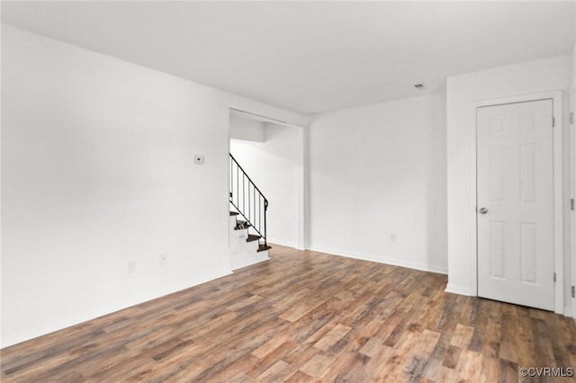 306 Cedarwood Rd, Henrico, VA 23075 - spare room with wood finished floors and stairway