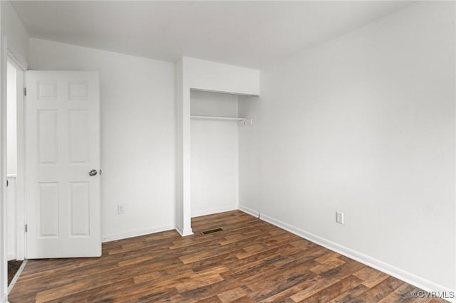 306 Cedarwood Rd, Henrico, VA 23075 - unfurnished bedroom featuring dark wood-style floors, a closet, and baseboards
