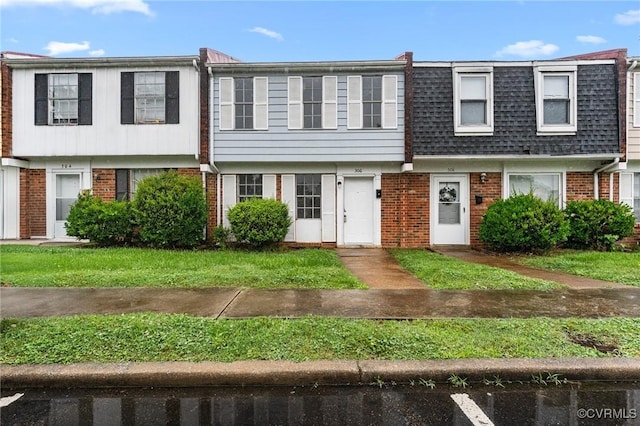306 Cedarwood Rd, Henrico, VA 23075 - townhome / multi-family property with brick siding, a shingled roof, and mansard roof