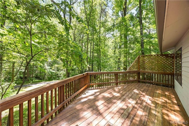 deck with a wooded view
