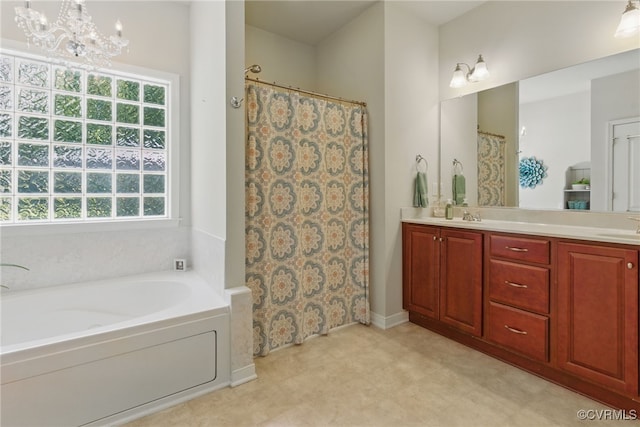 10335 Deerlake Dr, New Kent, VA 23124 - full bath with a garden tub, double vanity, a shower with shower curtain, and a chandelier