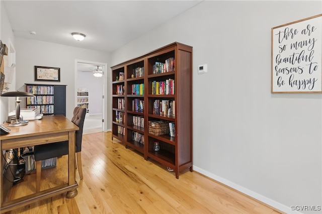 10335 Deerlake Dr, New Kent, VA 23124 - office space featuring light wood-style flooring, a ceiling fan, and baseboards