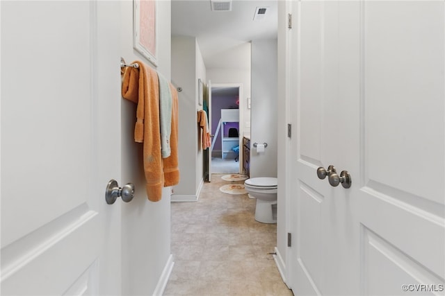 10335 Deerlake Dr, New Kent, VA 23124 - bathroom featuring baseboards and toilet
