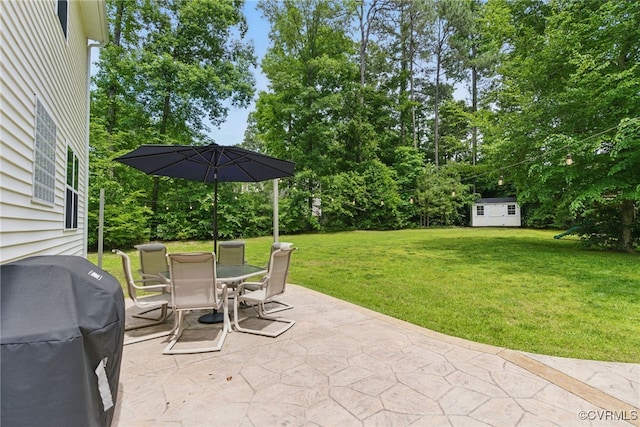 10335 Deerlake Dr, New Kent, VA 23124 - view of patio featuring outdoor dining area, a grill, and view of wooded area