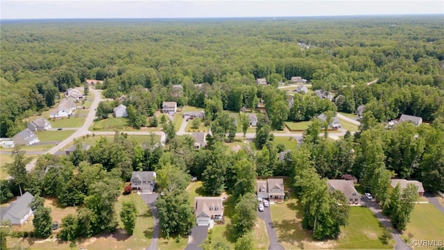 10335 Deerlake Dr, New Kent, VA 23124 - aerial perspective of suburban area featuring a forest