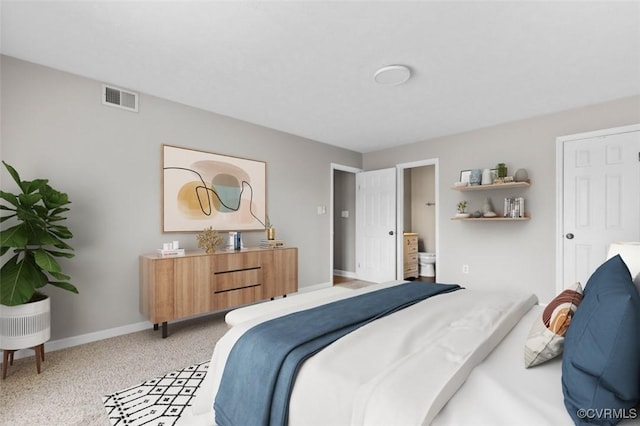 bedroom featuring baseboards and light carpet