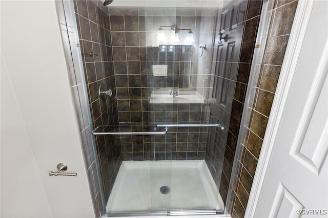 bathroom featuring a shower stall