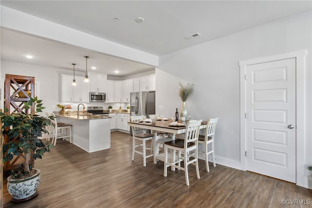 5301 Old Main St Unit A, Henrico, VA 23231 - dining space featuring dark wood-type flooring, recessed lighting, and baseboards